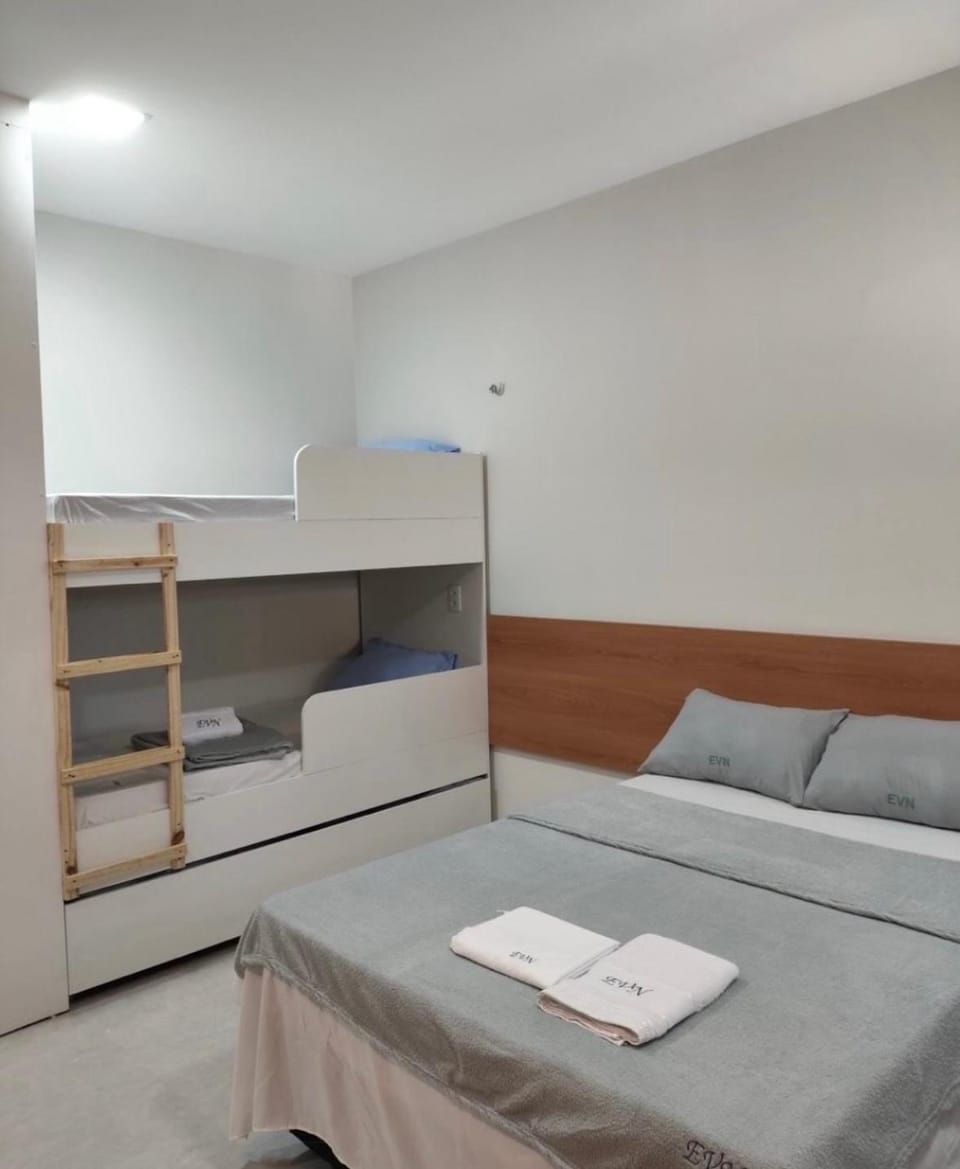 Bed, Photo of the whole room, Bedroom, bunk bed, towels, wardrobe