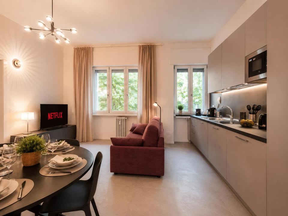 TV and multimedia, Coffee/tea facilities, Kitchen or kitchenette, Living room, Seating area, Dining area