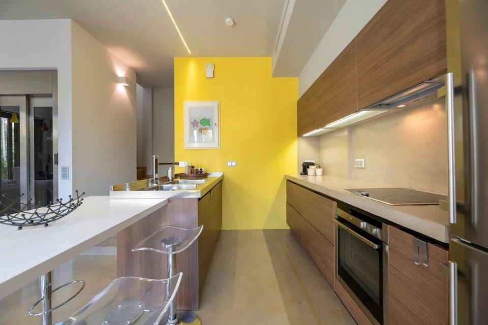 The HostMaster Glass House Apartment in Decentralized Administration of Attica