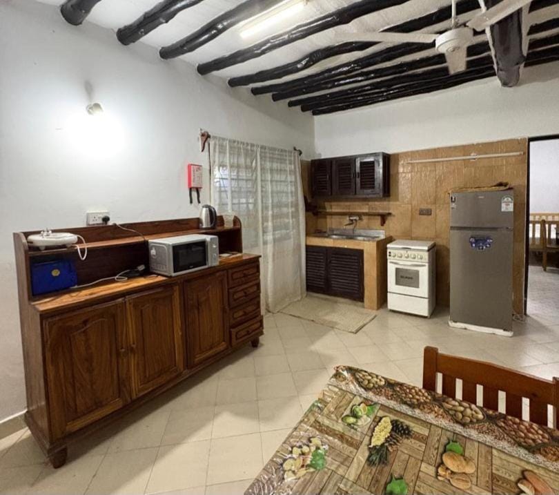 Kitchen or kitchenette, stove, toaster