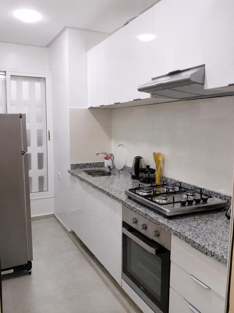 Kitchen or kitchenette, oven, stove