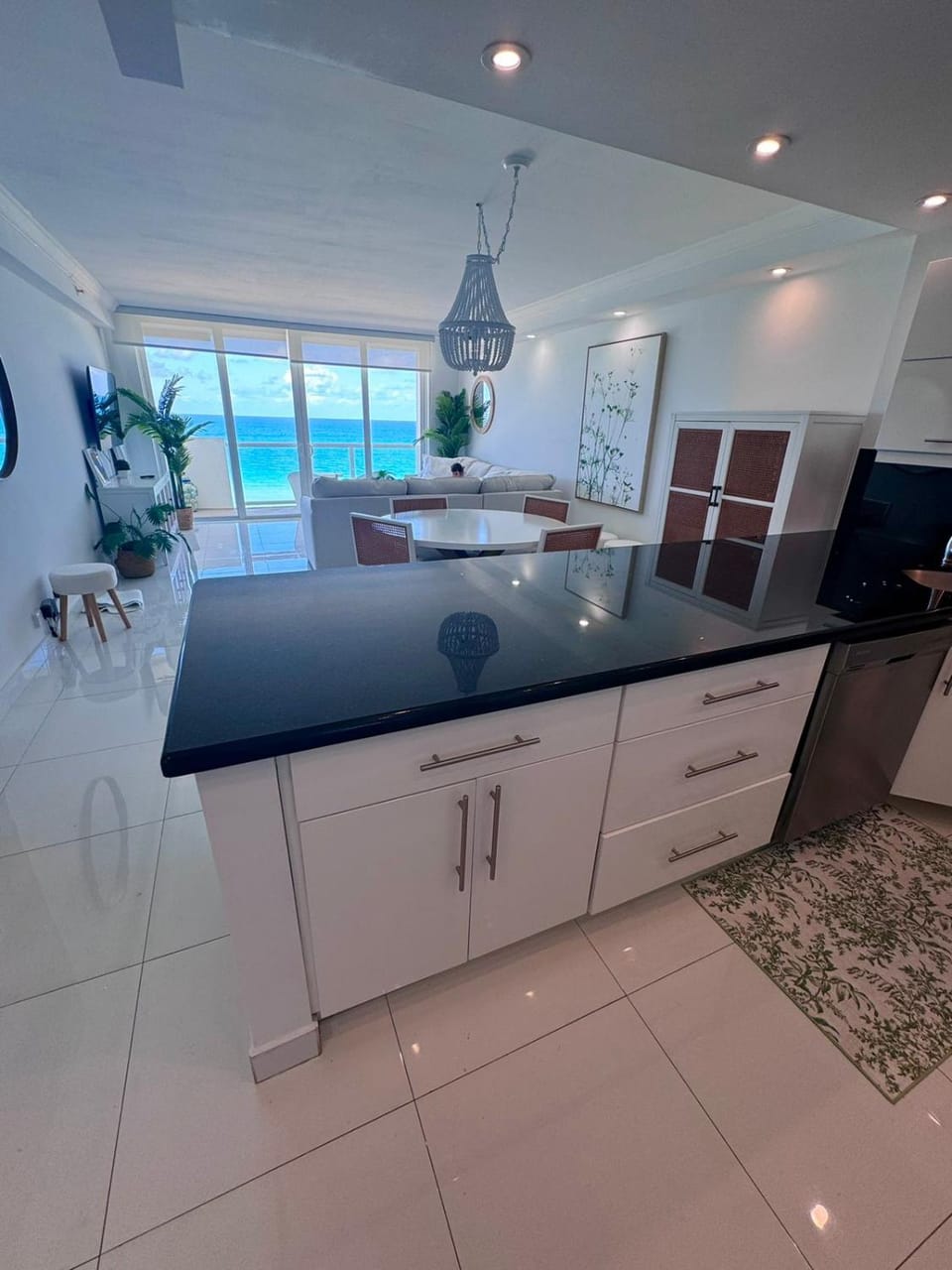 Kitchen or kitchenette, Sea view, dishwasher, stove