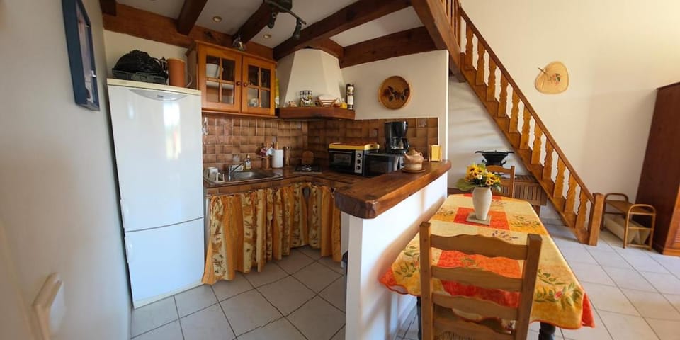 Kitchen or kitchenette, dishwasher, oven, stove