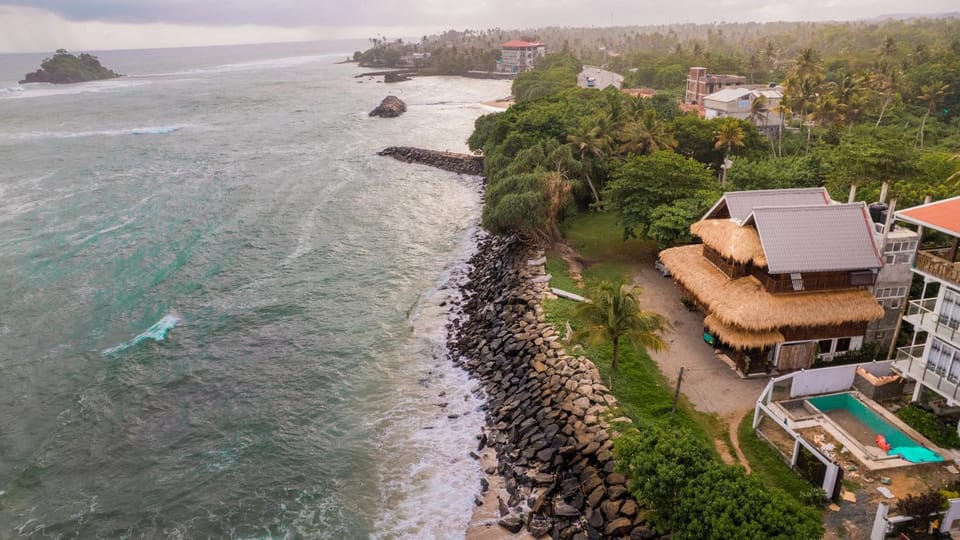 Property building, Nearby landmark, Day, Natural landscape, Bird's eye view, Beach, City view, Sea view