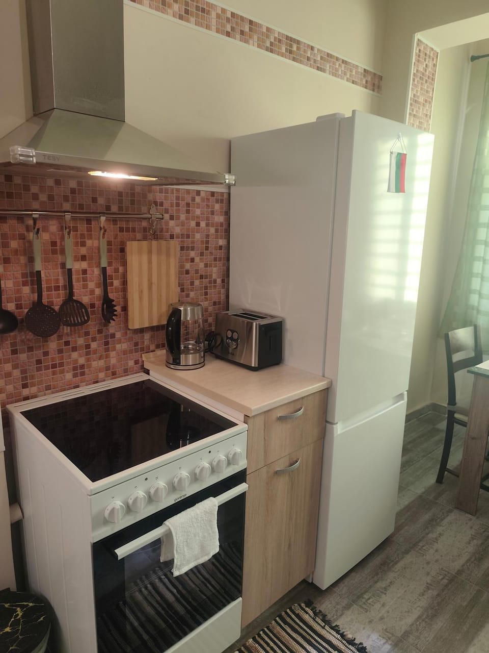 Kitchen or kitchenette, oven, stove, toaster