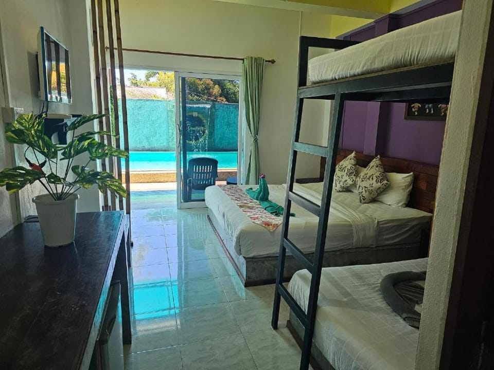 Bed, Pool view, Swimming pool, bunk bed, towels