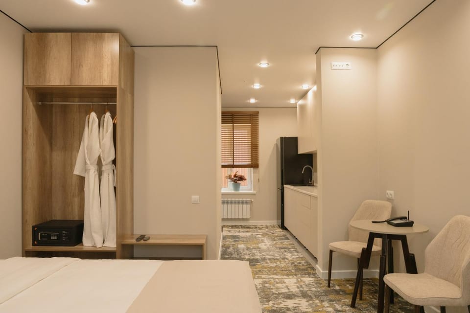 Seating area, Bedroom, towels, wardrobe