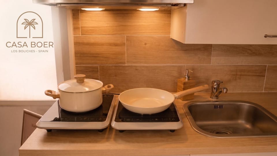Kitchen or kitchenette, stove