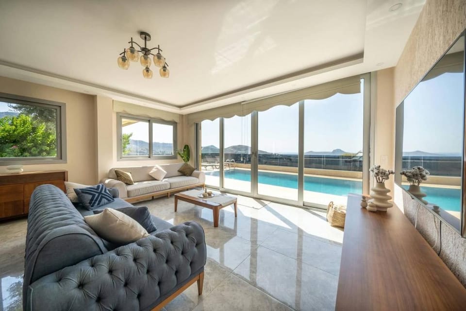 Living room, Seating area, Pool view