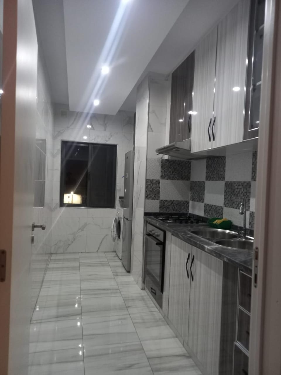 Kitchen or kitchenette, dishwasher, stove