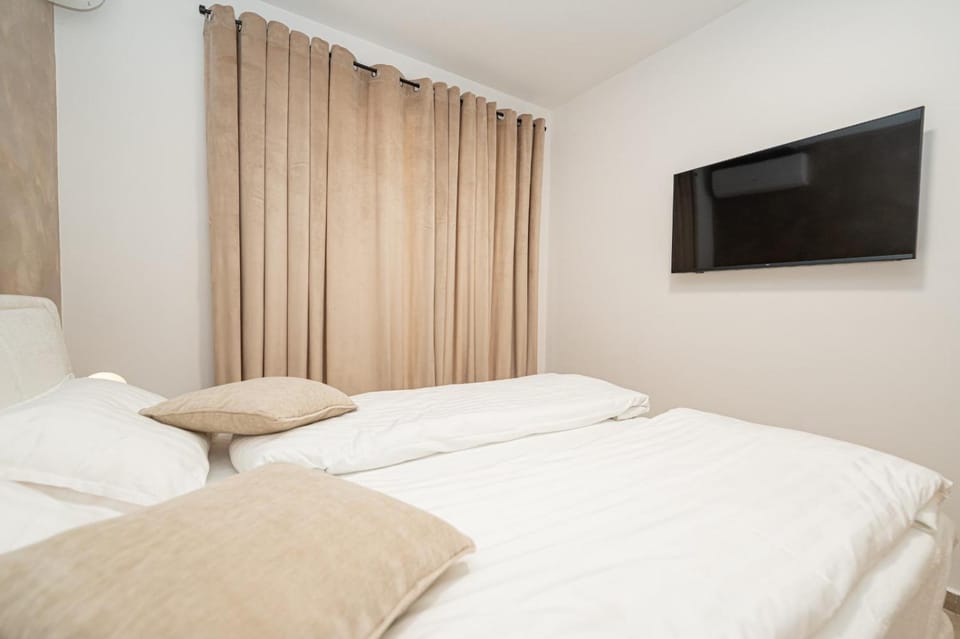 Bed, TV and multimedia
