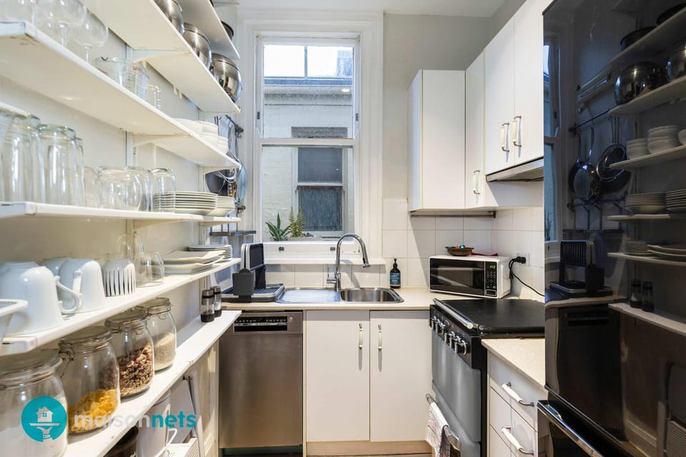 Kitchen or kitchenette, dishwasher, oven, stove, toaster