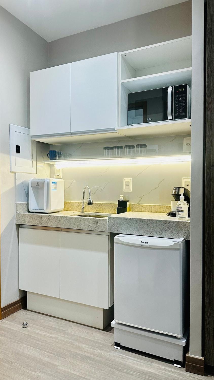Kitchen or kitchenette, microwave