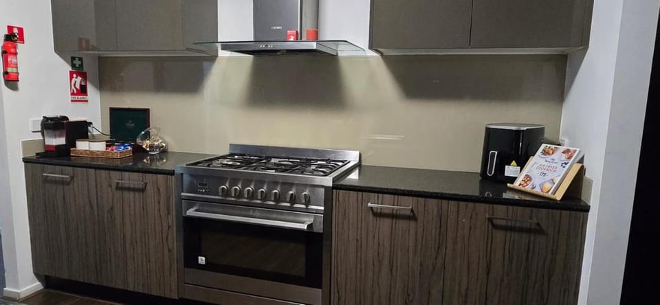Kitchen or kitchenette, stove