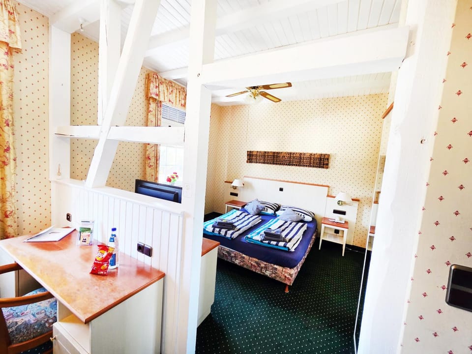 Bed, Seating area, Bedroom