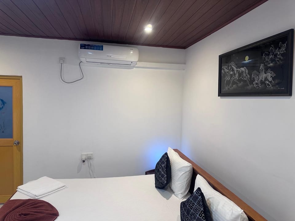 Photo of the whole room, air conditioner