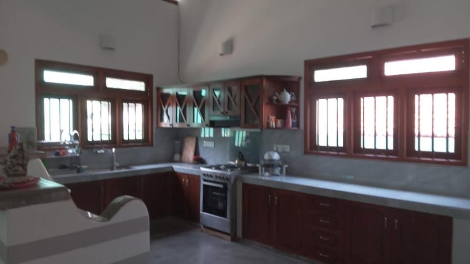 Kitchen or kitchenette, oven, stove