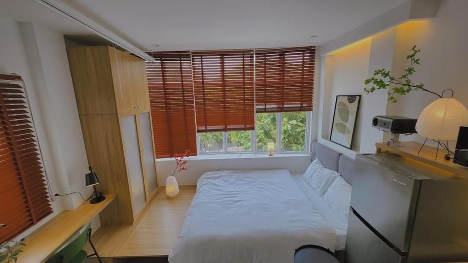 D1 Heart - Kitchen & Rooftop - Komorebi at Cozinema Apartment in Ho Chi Minh City