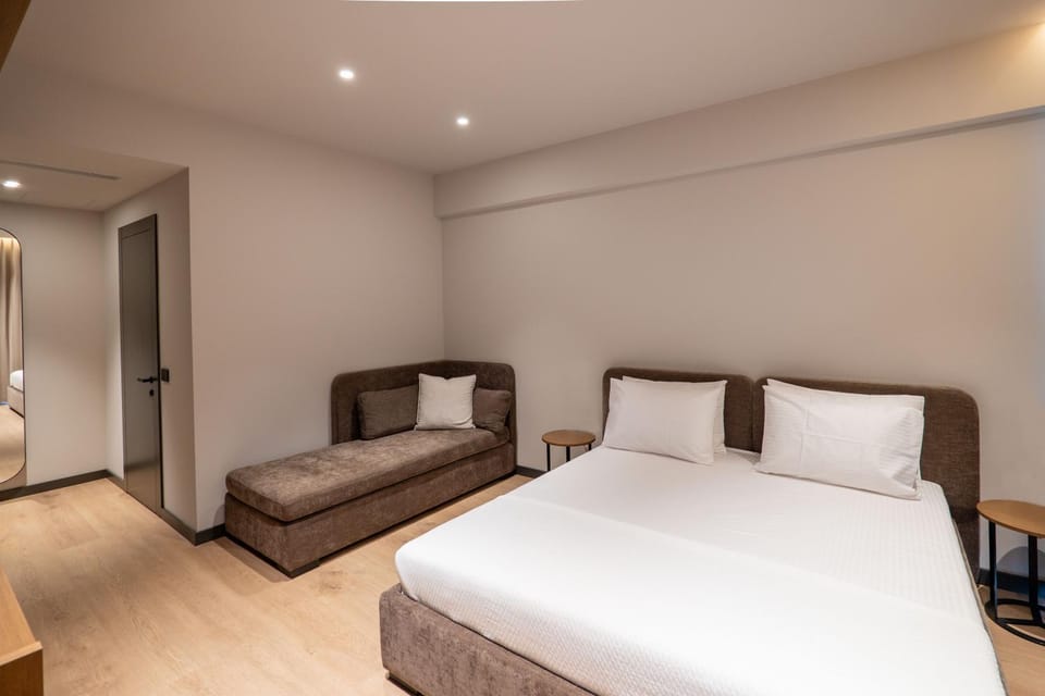 Bed, Seating area, wardrobe