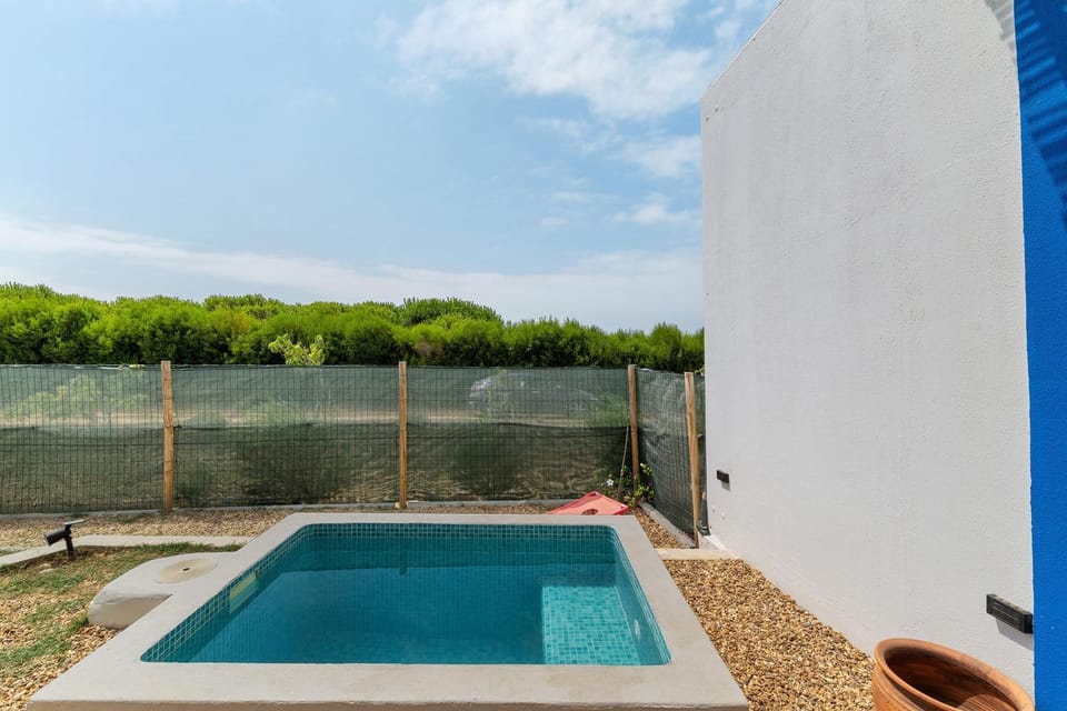 Property building, Living room, Swimming pool