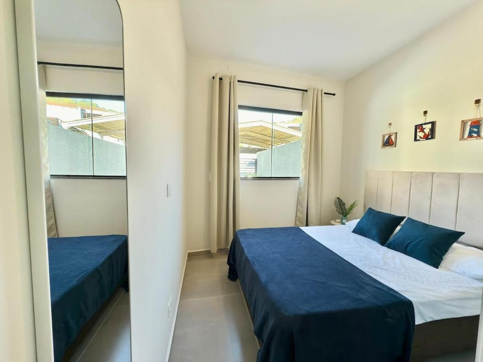 Casa com spa aquecido, suíte e garagem em Matinhos House in State of Paraná
