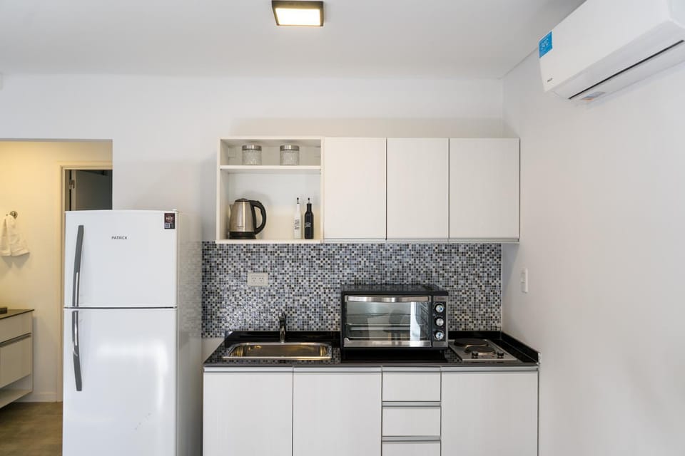 Kitchen or kitchenette, stove