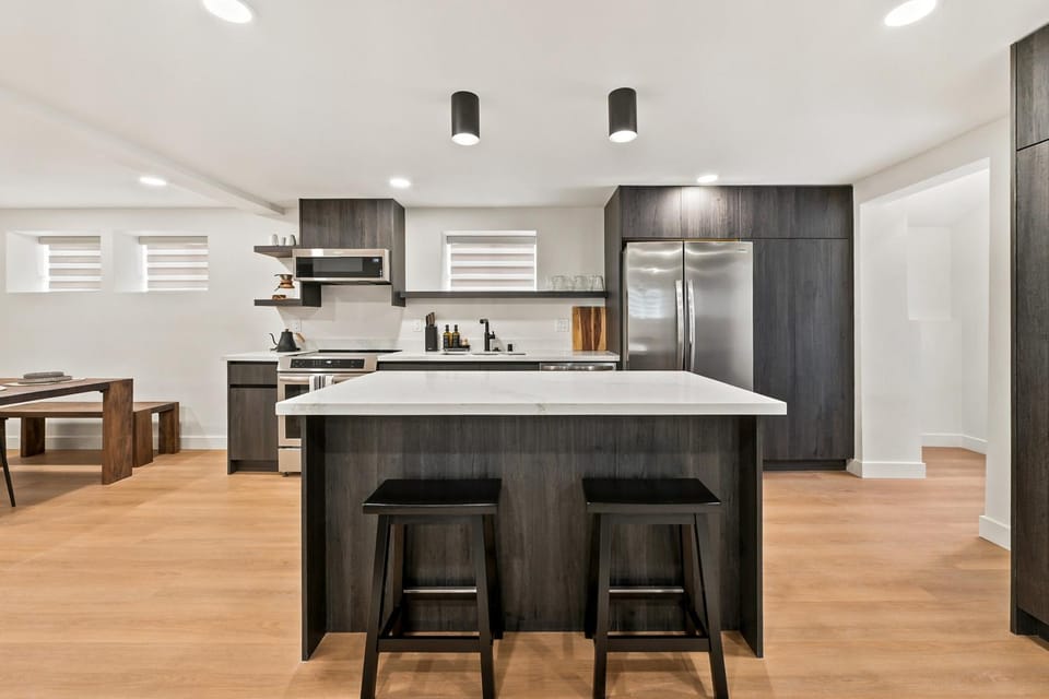 Kitchen or kitchenette, dishwasher, oven, stove