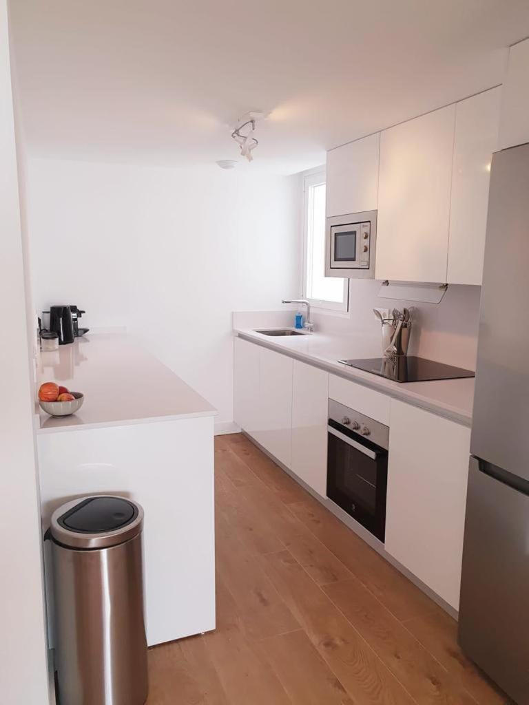 Kitchen or kitchenette, oven, stove