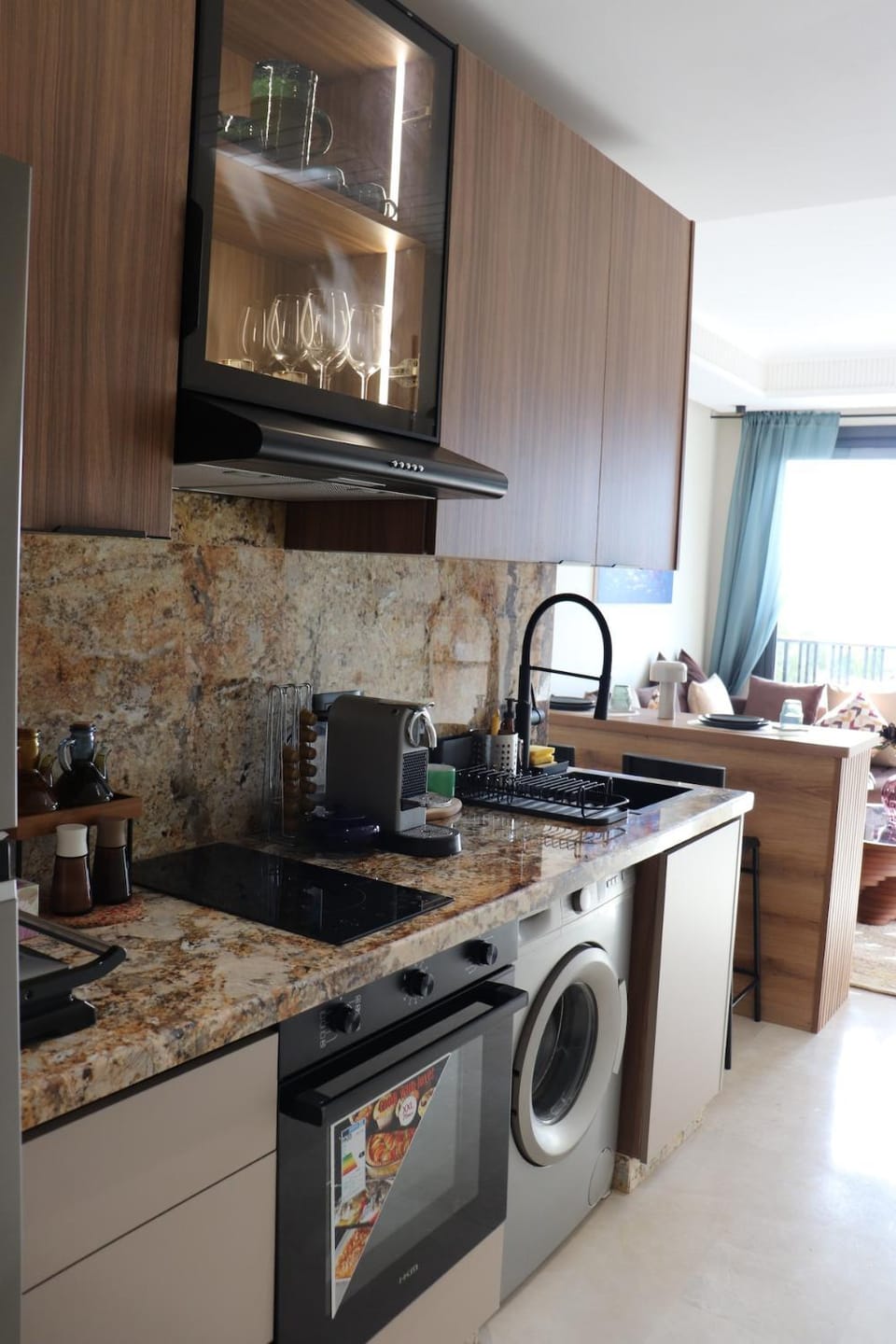 Kitchen or kitchenette, stove, washing machine