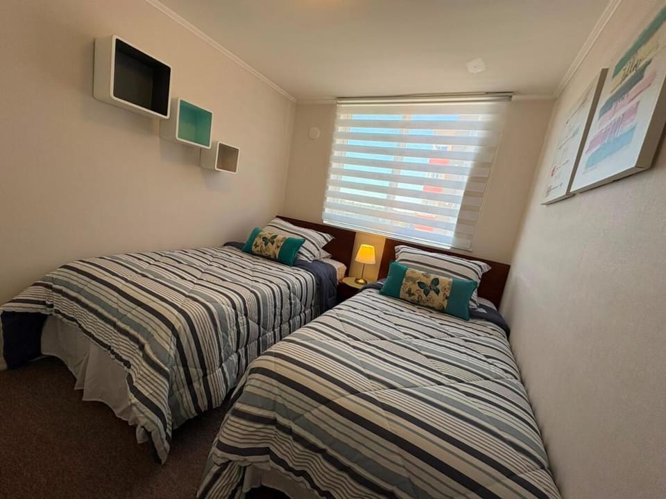 Departamento para 5 personas ideal para empresas 5 camas individuales Apartment in Los Ángeles