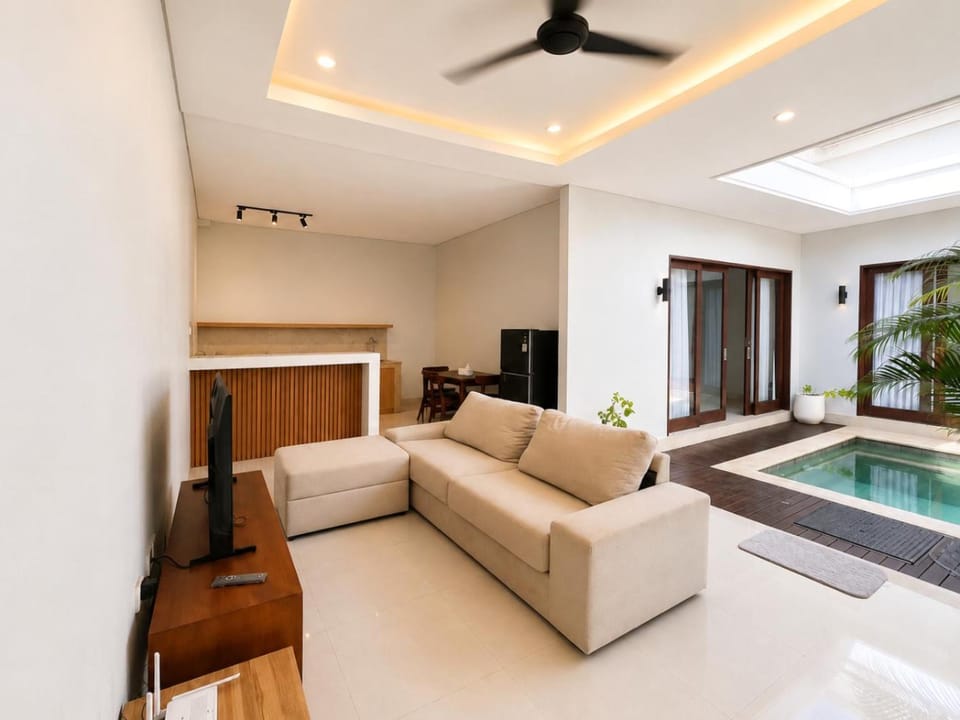 TV and multimedia, Living room, Seating area, Pool view, Swimming pool