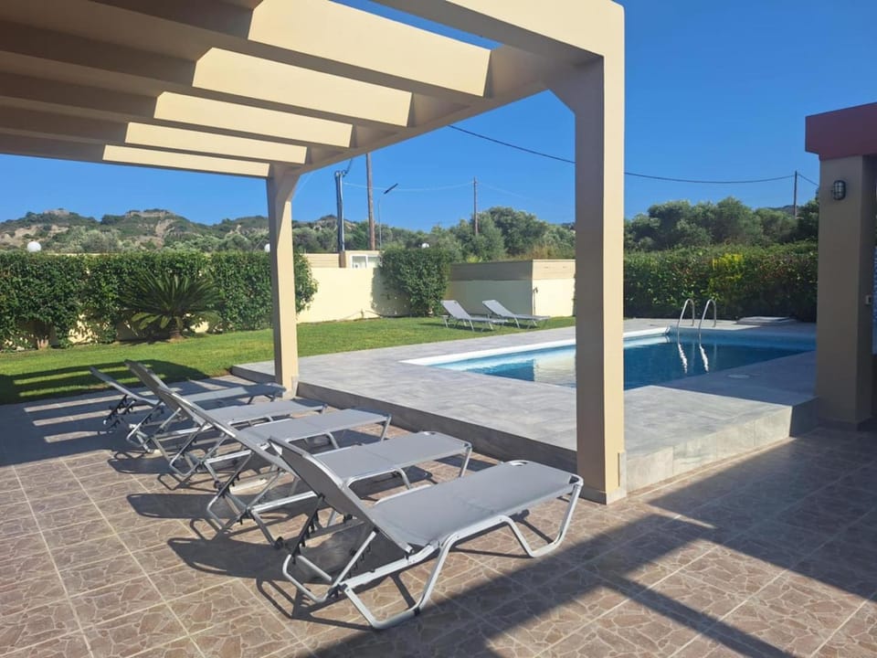 Patio, Natural landscape, Pool view, Swimming pool, sunbed