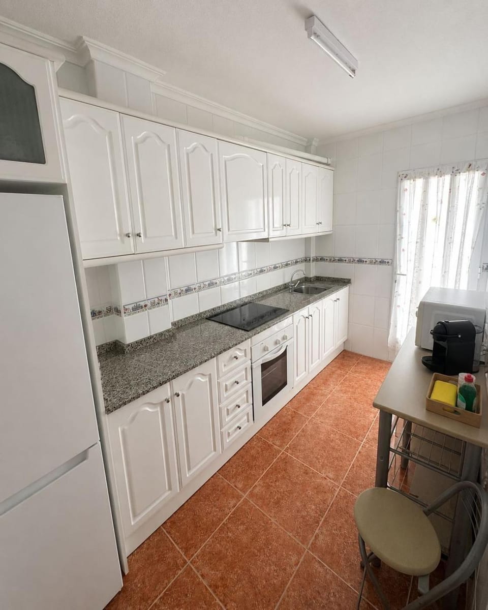 Kitchen or kitchenette, oven, stove, toaster