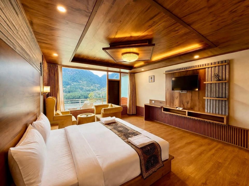 Bed, Seating area, Mountain view