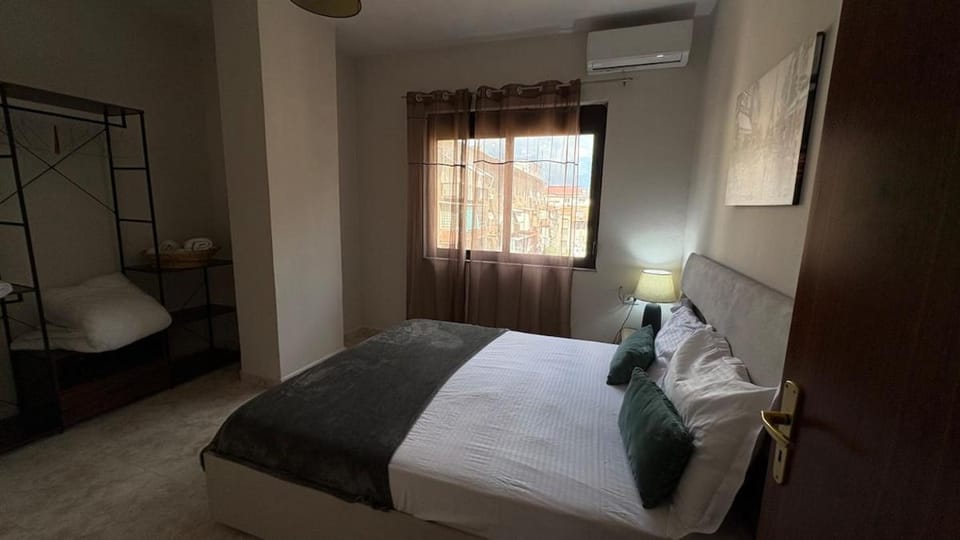 Bed, Photo of the whole room, Bedroom, towels, air conditioner