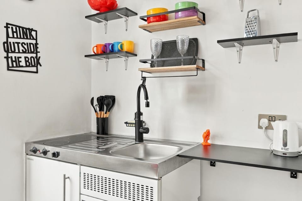 Kitchen or kitchenette, stove