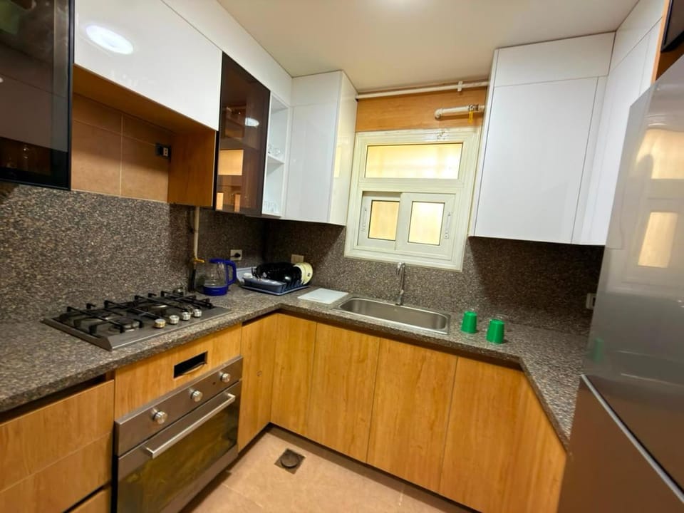 Cozy 2 bedrooms groundf with private garden Apartment in Cairo Governorate