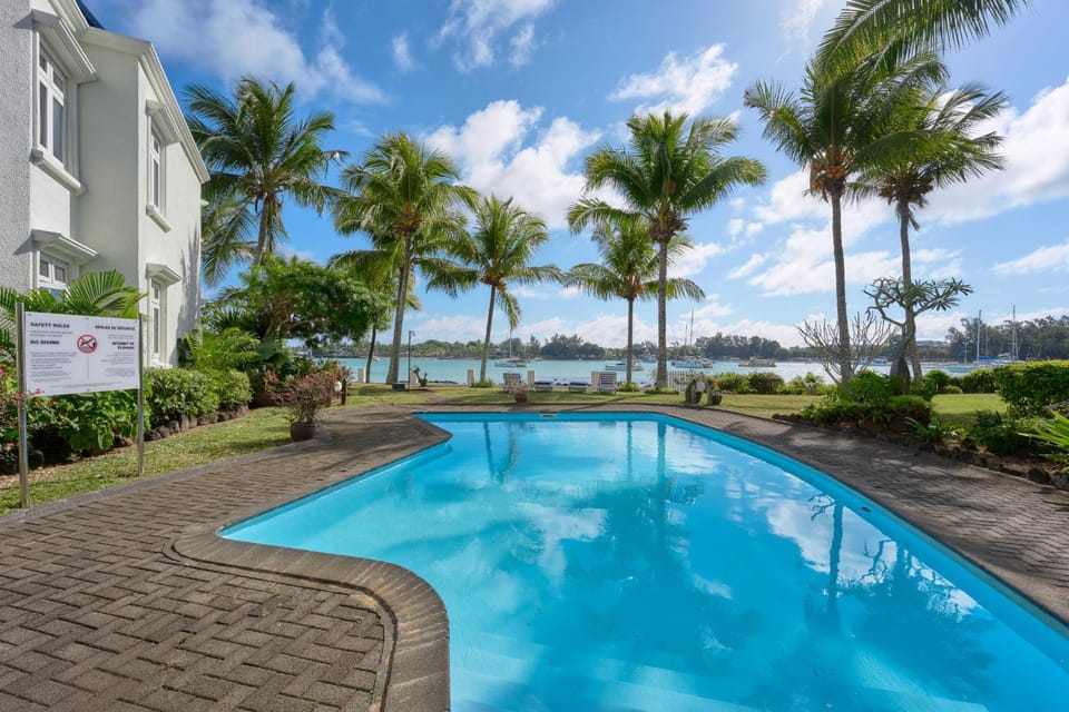 Property building, Natural landscape, Garden, Garden view, Pool view, Swimming pool