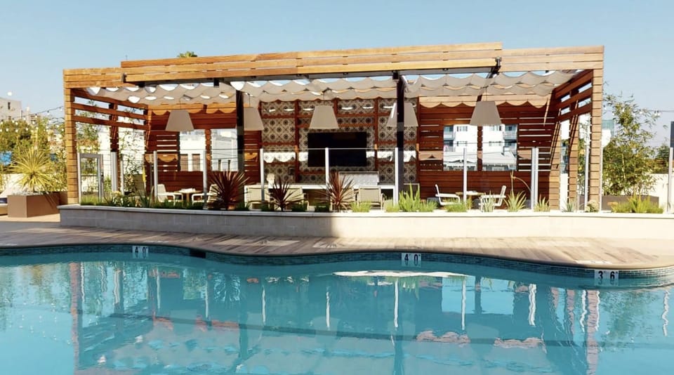 Property building, Patio, Swimming pool, sunbed