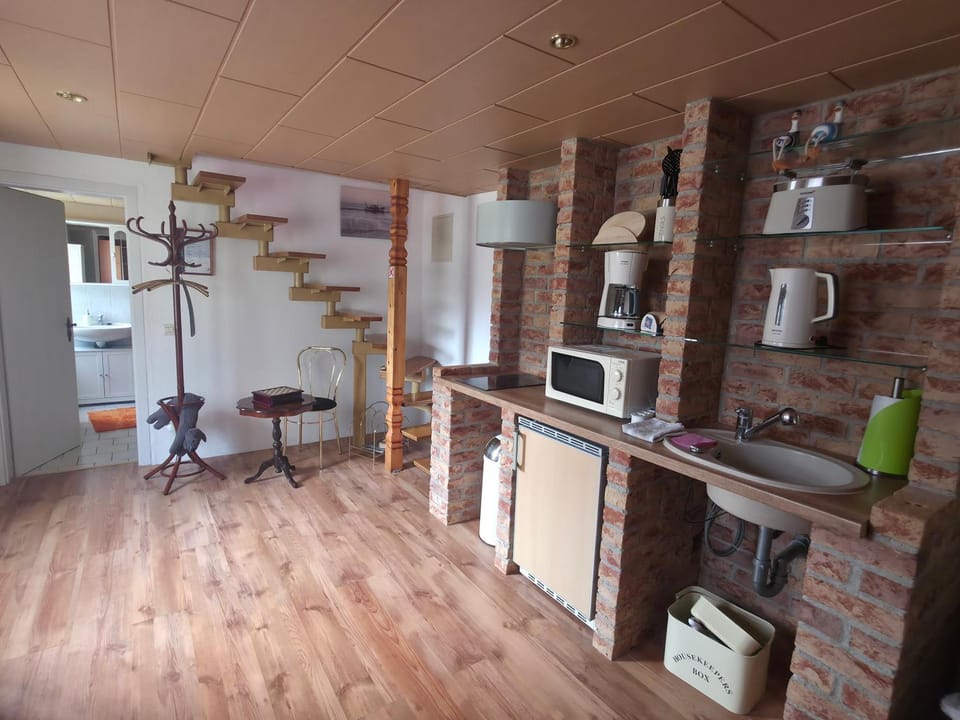 Kitchen or kitchenette, stove, toaster