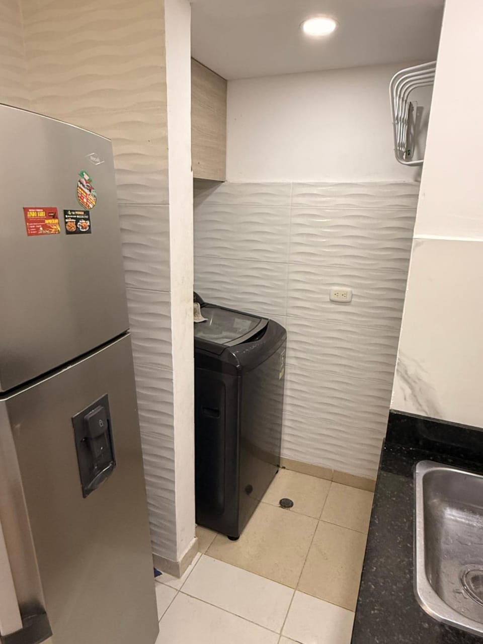 Kitchen or kitchenette, washing machine