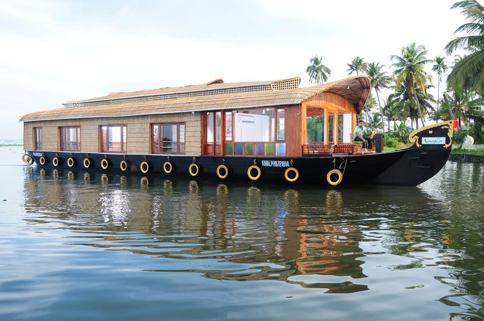 Kumarakom Houseboat Holidays Docked boat in Kumarakom