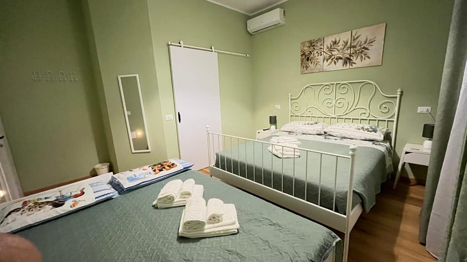 Bed, Photo of the whole room, Bedroom, towels, air conditioner