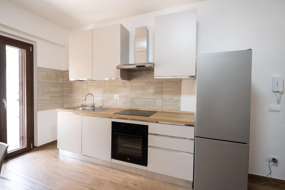 Kitchen or kitchenette, oven, stove
