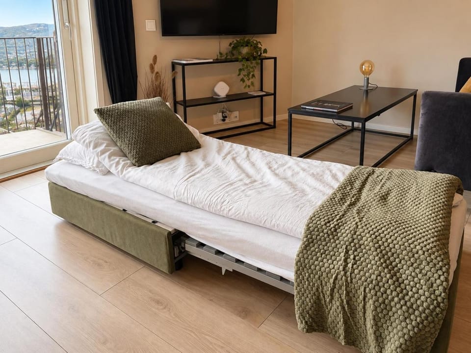 Bed, Living room, Seating area, Bedroom