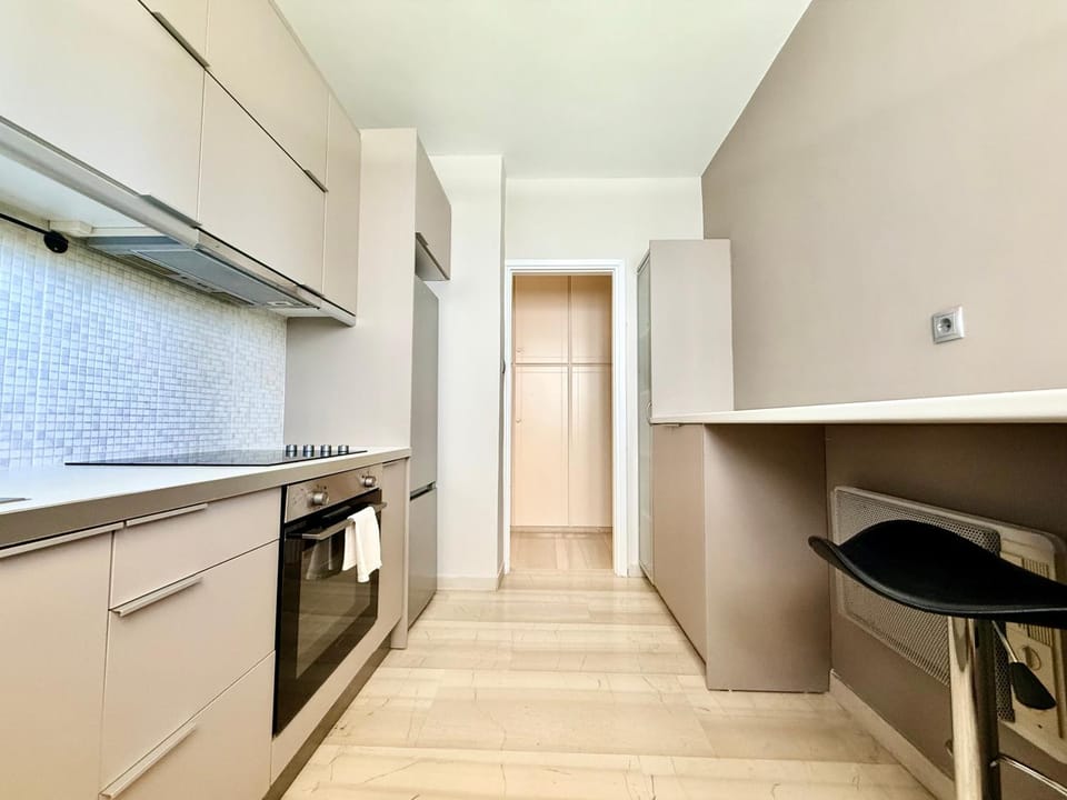 Kitchen or kitchenette, dishwasher, oven, stove