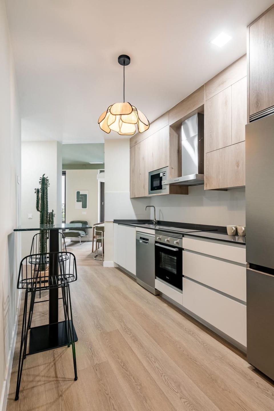 Kitchen or kitchenette, dishwasher, oven, stove