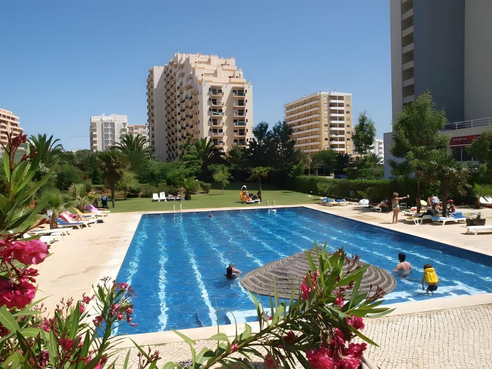 Property building, Living room, Swimming pool