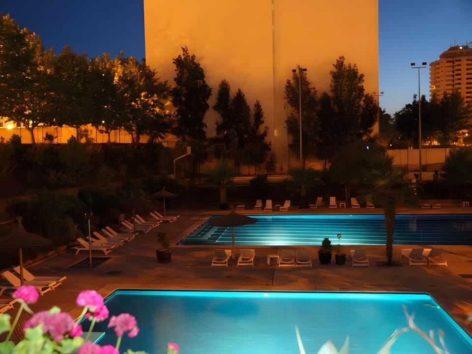 Property building, Living room, Swimming pool
