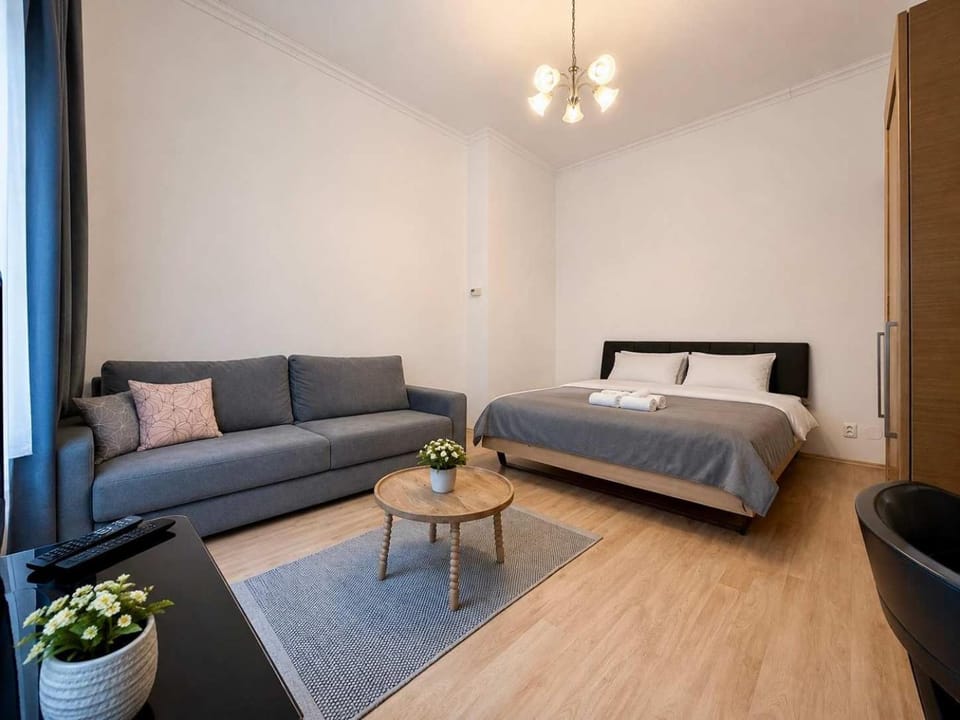 Bed, Living room, Seating area, Bedroom